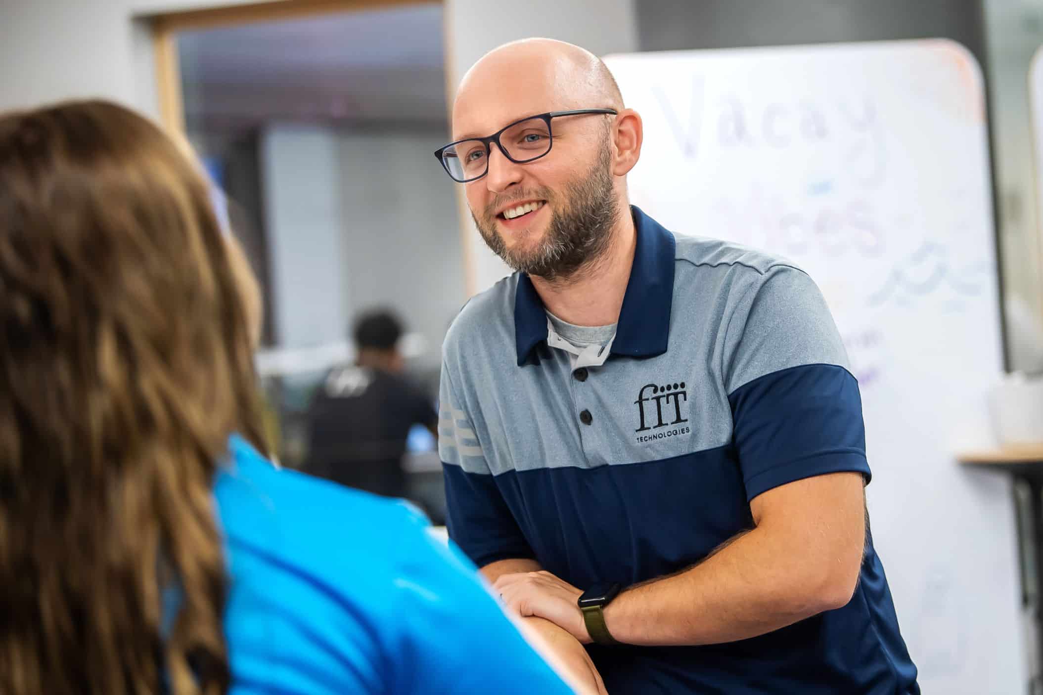 smiling FIT employee