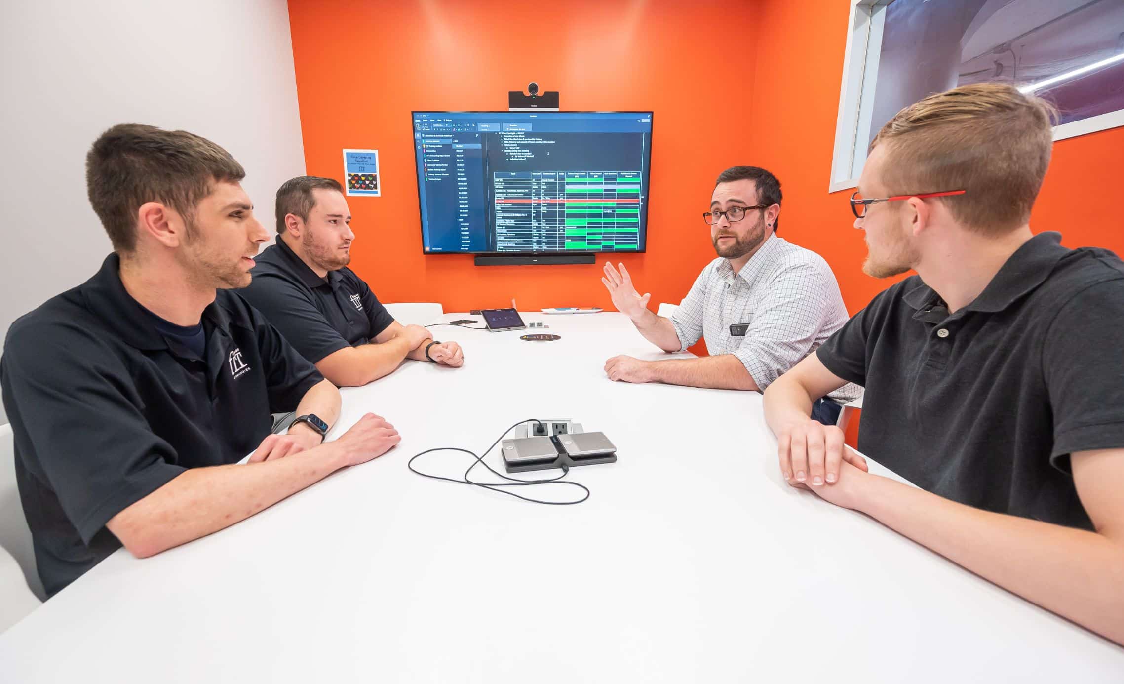 group of guys in a meeting