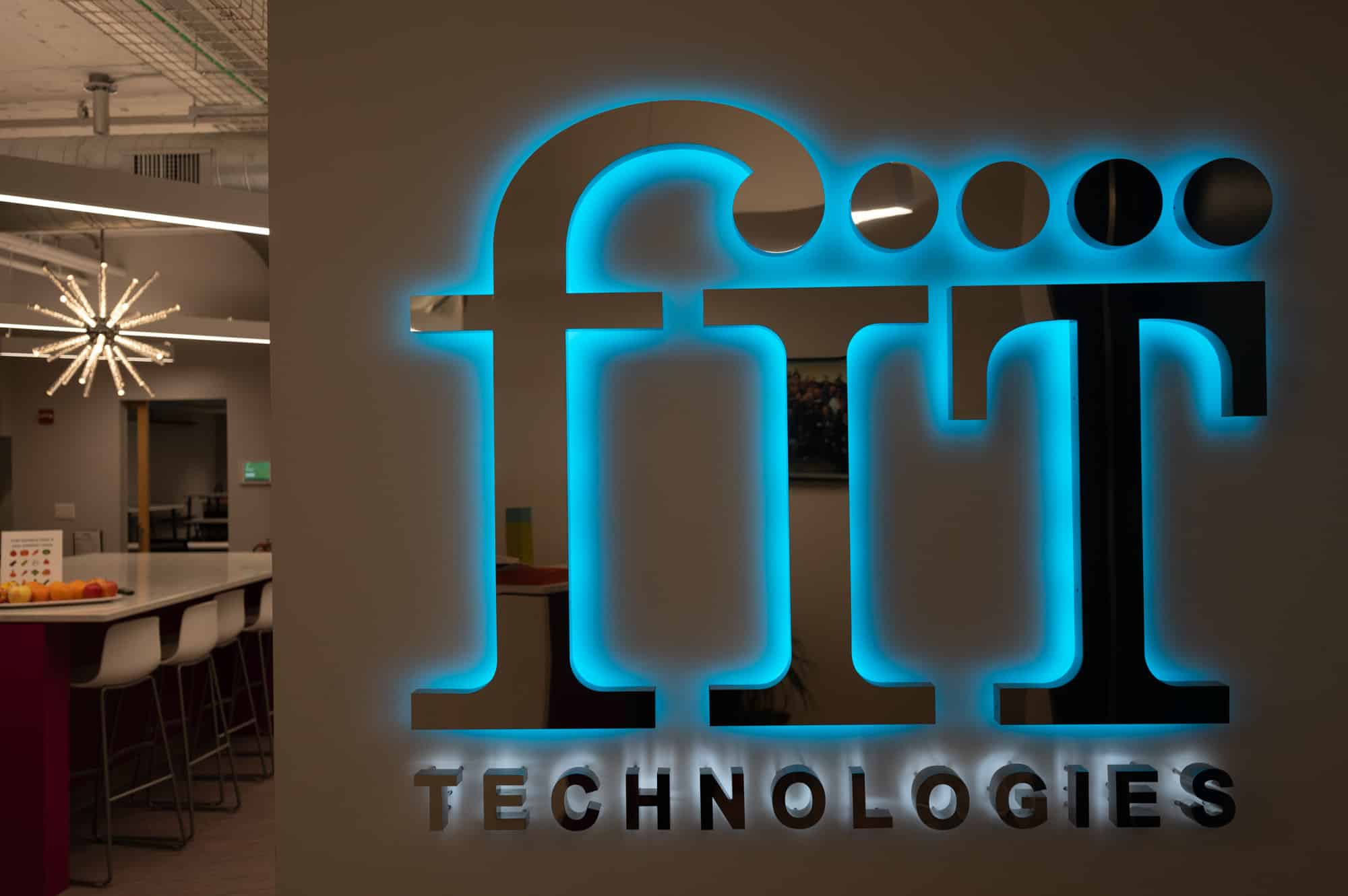 lit up FIT Technologies sign