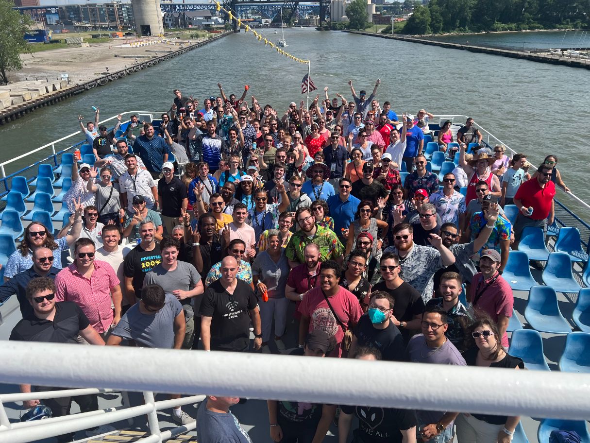 smiling FIT team on a boat