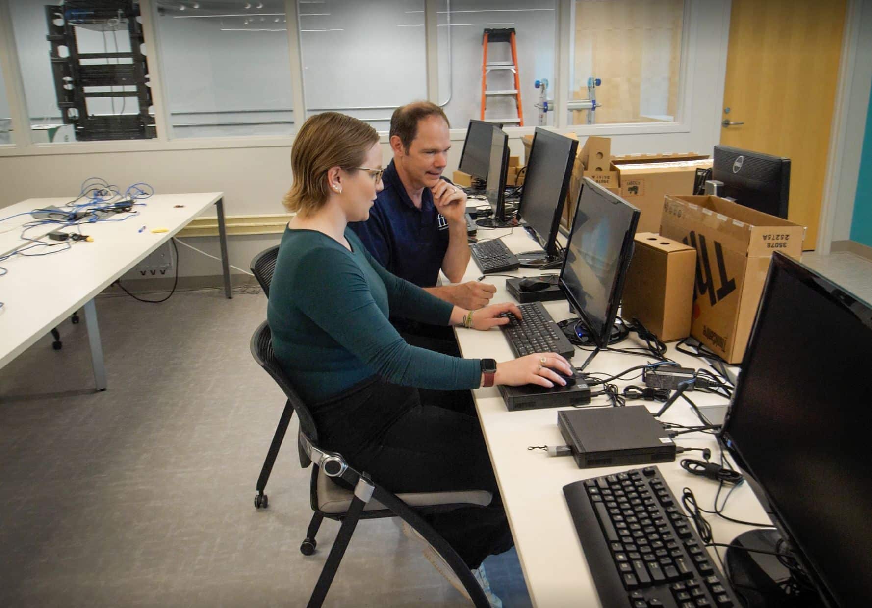 FIT team working on computer